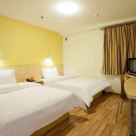 7Days Inn Dongguan Conference & Exhibition Center Rum bild